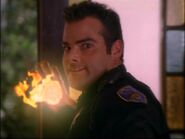 Ciril (Charmed) generating a fireball.