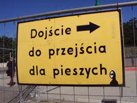 Tablica na płocie odgradzającym remont/przebudowę Kaponiery, przy Moście Teatralnym - po kilku dniach od zrobienia zdjęcia Pan Peryskop został zmyty z tablicy; aktualnie tablicy już nie ma