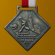 Awers medalu pamiątkowego 3 edycji półmaratonu.