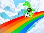 Hoppy kicking a soccer ball on a rainbow, seen in the Smiling Critters intro.