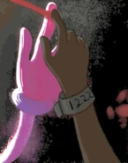 Ditto, but with a close-up on her hand and increasing brightness, revealing her experiment number.