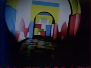 A person (presumably The Player) is running down a hall.