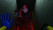 Mommy's first appearance in Chapter 2, in the Game Station Hallway holding Poppy Playtime.