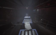 A path created by Crates and a Grapple Handle.