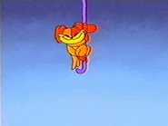 DogDay pulling on CatNap's tail to reveal the logo.