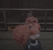 Poppy with The Player on elevator.