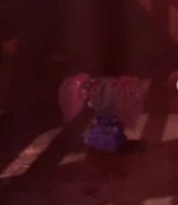 Poppy fleeing in panic through the pipe after The Prototype's statements.