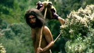 A family of Homo Heidelbergensis traveling through the forest.