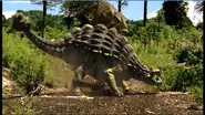 Smack.webp (194 KB) A Tyrannosaurus fighting against an Ankylosaurus.