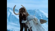 A Woolly Mammoth herd being attacked by a hunting party of Paleo-Indians.