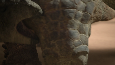 A Prenocephale nips at a juvenile Tarchia in an attempt to drive it away from an oasis