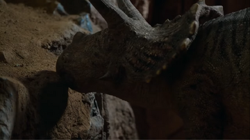 Triceratops scraping mineral clay off of a cave wall