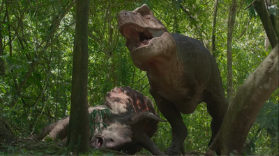 A T. rex alongside a freshly-slain Triceratops