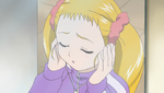 Urara listens to her song again before the performance