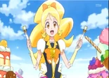 Cure Honey uses the baton in Maracas Mode.