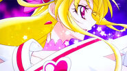 Cure Heart lanzando la Fuerte Flecha Encantadora Pretty Cure