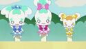 The mascots in the Pretty Cure outfits