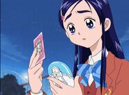 Honoka con su Card Commune apunto de transformarse por primera vez