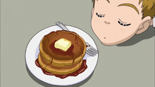 Syrup sniffs the pancakes because he doesn't know what they are