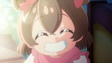 Yui grins