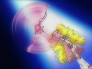 034.jpg (102 kB) Batuta Heartiel girando en la mano de Luminosa