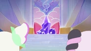 Pikarine encased in purple crystal inside the throne room