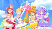 Tropica ING Cures pose while holding their Ocean Prism Mirrors.jpg