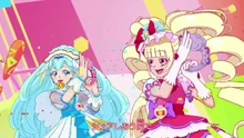 Cure Macherie acknowledging Cure Ange as she sings
