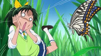 April seems startled by a butterfly