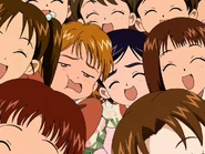 Nonomiya on the right squeezing in the group photo.