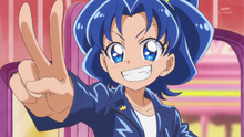 Aoi does a victory sign