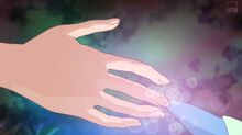 Power forms as Chiyu and Pegitan's fingers meet