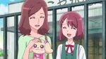 Yasuko happily pats Latte's head