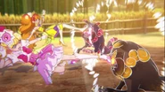 Cure Miracle y Cure Twinkle golpeando a Akainu y Kiinu