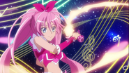 Cure Melody usando el "Rondó Musical Pretty Cure" en el escenario "Wonderful ↑ Powerful ↑ Music!"