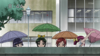 Miyuki having trouble with her umbrella