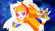 Cure Twinkle con la Vara Princesa apunto de realizar la "Trinidad de Luz Pretty Cure"