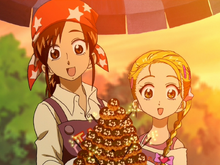 Akane and Hikari give Nagisa a takoyaki cake in episode 33