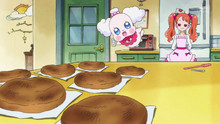 The hungry Pekorin is allowed to eat Ichika's cakes