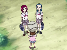 Michiru and Kaoru see a ball coming towards Minori