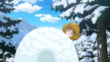 Minori introduces herself from behind an igloo