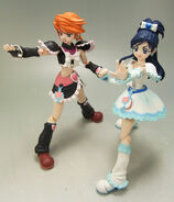 Figura de Cure Black y Cure White lanzando el "Rayo de Mármol Pretty Cure
