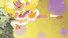 Soleil performs a flying kick