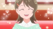 Tomoe smiles happily