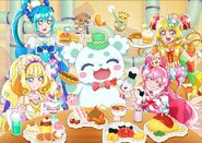 Visual de las Pretty Cure comiendo almuerzos infantiles con Cait Sith