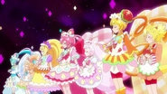 Las Pretty Cure y sus hadas apunto de usar el ataque final
