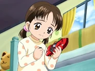 Nozomi tries to fix the broken car.