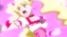 Cure Peach attacking