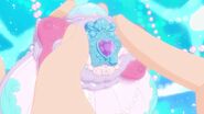 Laura inserting her Heart Kuru Ring into the Mermaid Aqua Pact