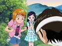 Nagisa and Honoka are watching Takashi and Ryouta cook rice over a fireplace